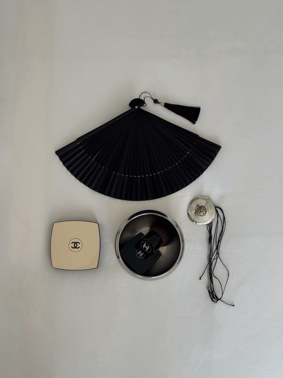 A mood in black.Powerful, feminine, and effortlessly refined. A silhouette designed to flatter, with soft draping and...