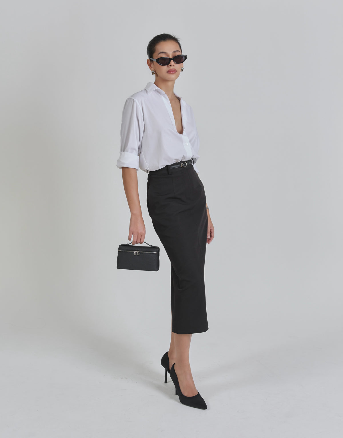 Pair our Essentials cotton shirt in white with Essentials midi pencil skirt in black for the days you need to be in c...