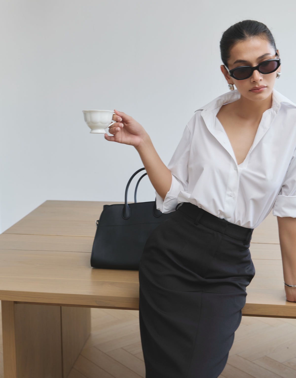 Pair our Essentials cotton shirt in white with Essentials midi pencil skirt in black for the days you need to be in c...