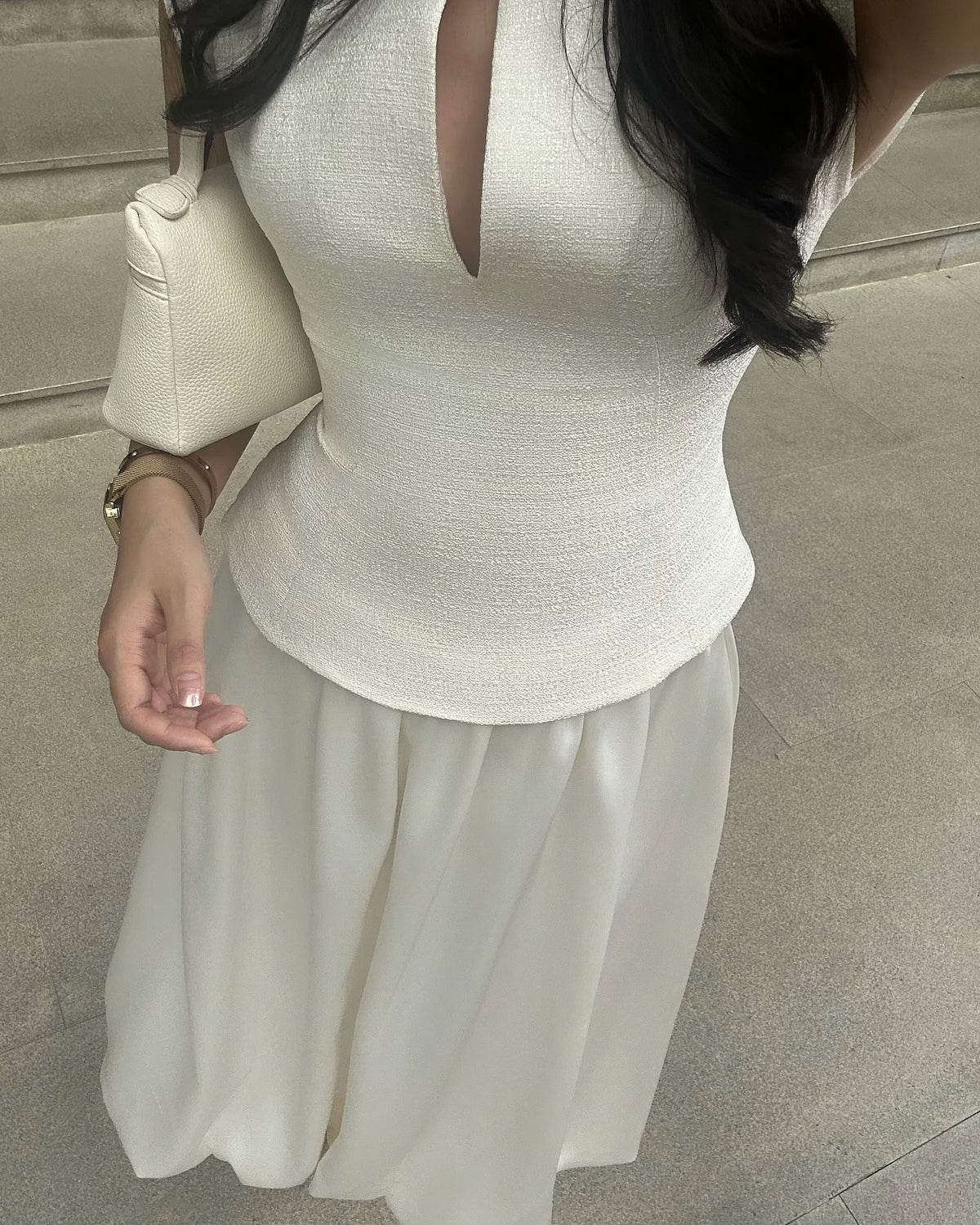 You loved the dresses.But what if you just want the top part—that iconic neckline and structured shoulder—styled your...