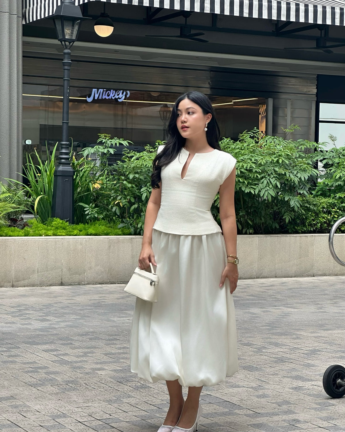 You loved the dresses.But what if you just want the top part—that iconic neckline and structured shoulder—styled your...