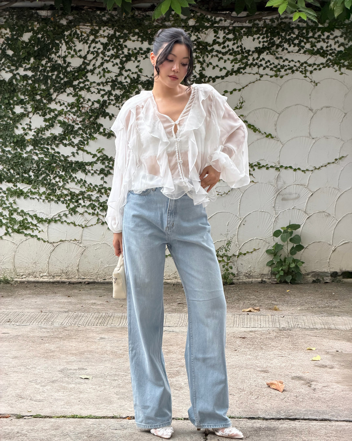 Pair Reverie Ruffle blouse in white with your favorite jeans to get casual effortless look 🤍#rvessentialsreverieruffl...