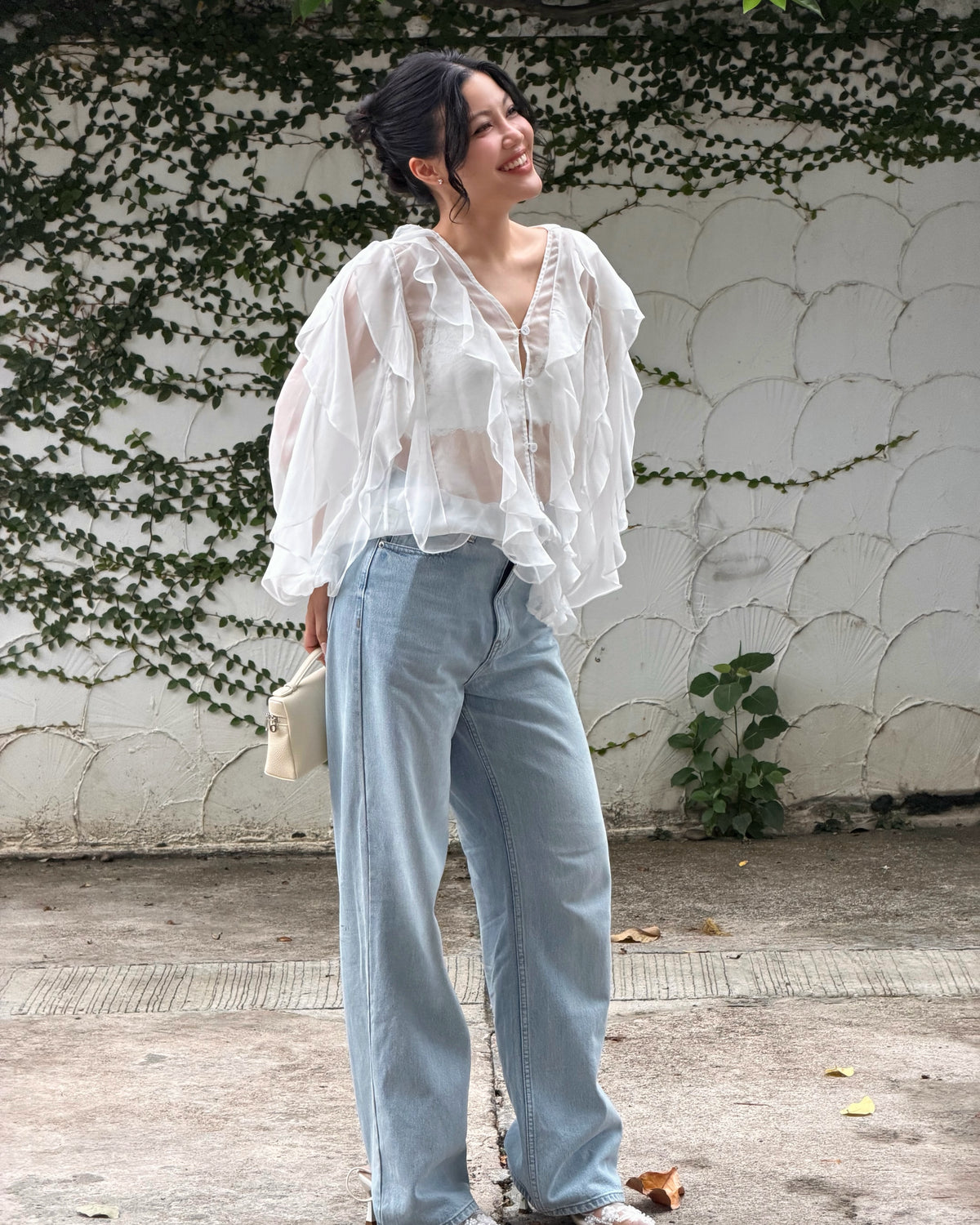 Pair Reverie Ruffle blouse in white with your favorite jeans to get casual effortless look 🤍#rvessentialsreverieruffl...