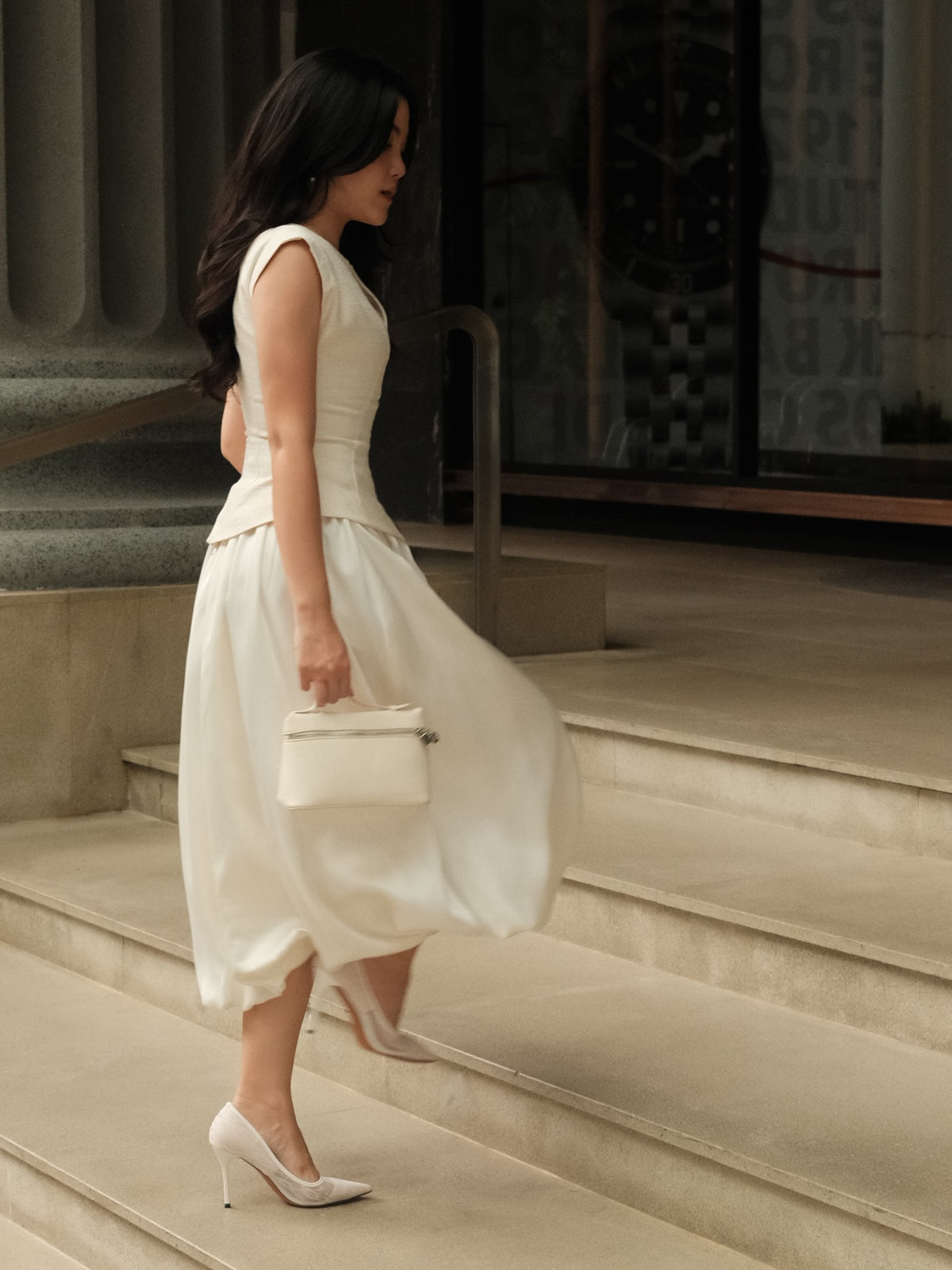 Caught mid-run, still looking like a dream.The tweed-meets-satin duo that turns every moment into a statement.〰️Blair...