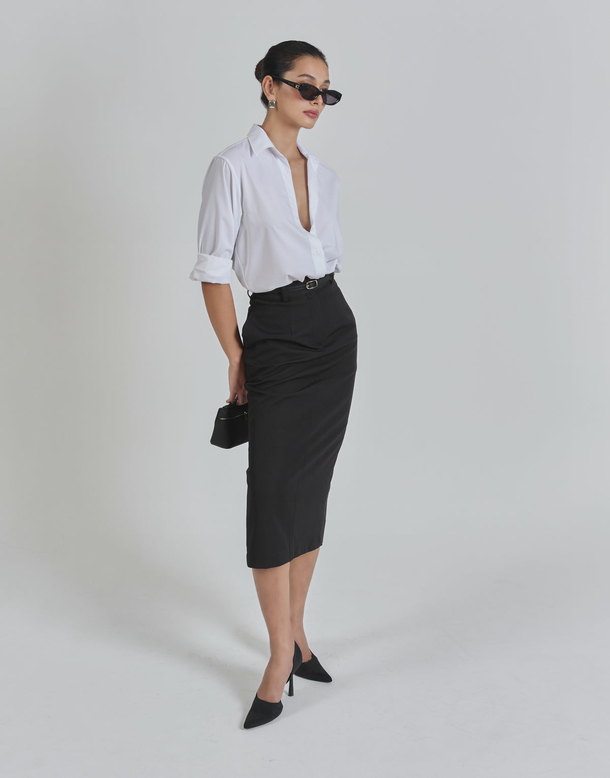 Pair our Essentials cotton shirt in white with Essentials midi pencil skirt in black for the days you need to be in c...