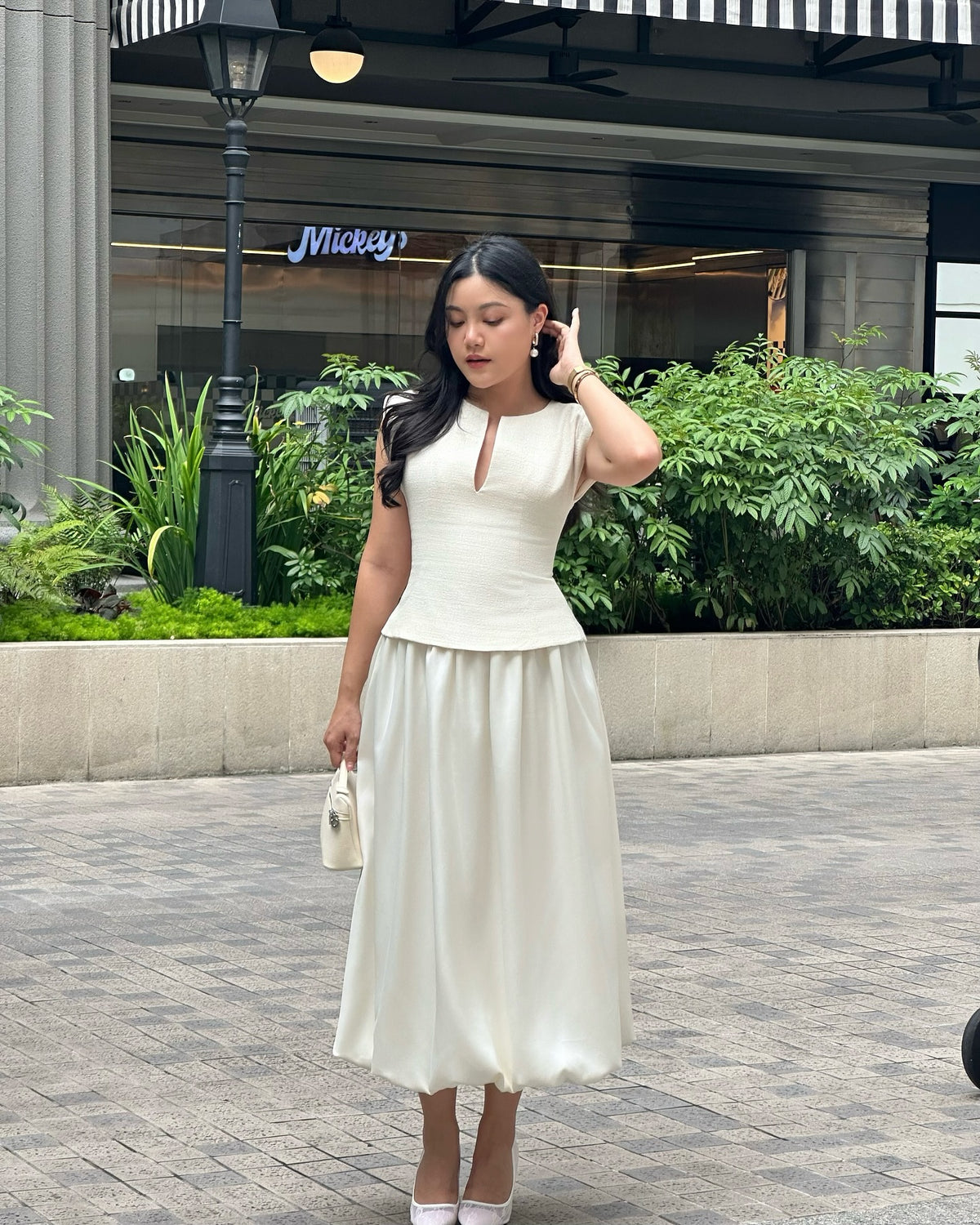 You loved the dresses.But what if you just want the top part—that iconic neckline and structured shoulder—styled your...