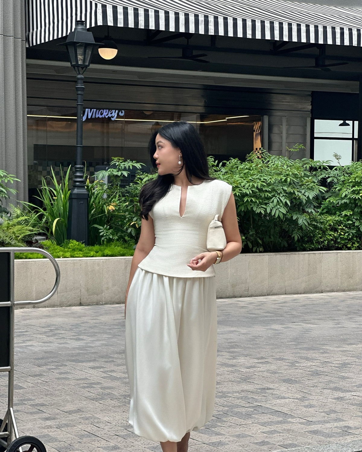 You loved the dresses.But what if you just want the top part—that iconic neckline and structured shoulder—styled your...