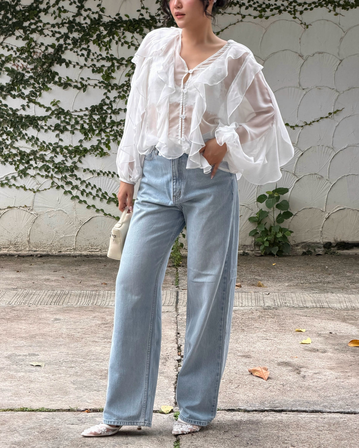 Pair Reverie Ruffle blouse in white with your favorite jeans to get casual effortless look 🤍#rvessentialsreverieruffl...